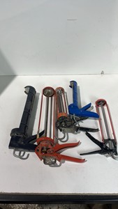 Lot Of Caulking Guns In Various Sizes