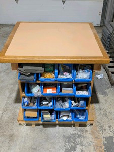 Rolling work table with built-in shelving