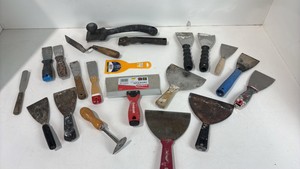 Lot of scrapers and spackling tools