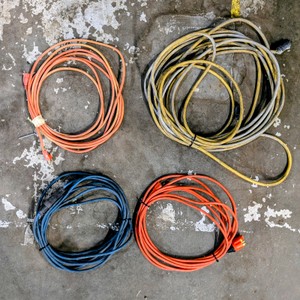 Lot of (4) extension cords.