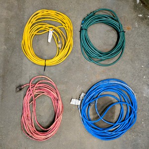 Lot of (4) extension cords.
