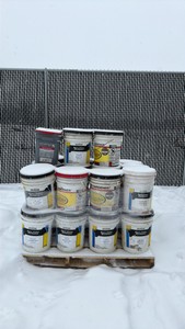 Pallet of buckets of color hardener for concrete