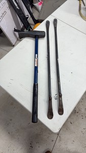 (2) Tire Spoons - tire irons (1) Small sledge hammer