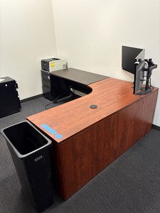 Office desk and garbage bin