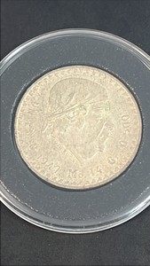 14 grams of silver 50% 1947 Un Peso