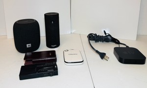 (2) WIRELESS Speakers, (1) Apple TV unit, (1) Aluratek portable battery charger & Phillips Pro pocket memo