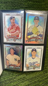 MIX Sports lot in binder 33 pages- 4 cards per page(132 total) with stars, rookies, and  inserts