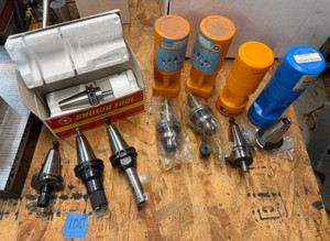 CNC CV40 assorted tool holders for milling many appear to be new