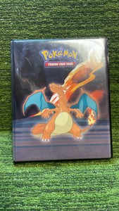 Pokmon Mix Lot Book containing approximately 50 cards