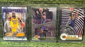 LeBron James 3 Card Lot Serenity insert, 202-21PRIZM Dominance, & 2021 Optic T-Minus. L.A. Lakers