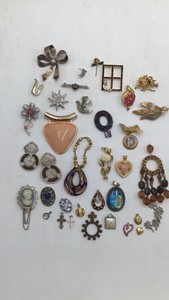 Assortment of Brooches and Necklace Pendants