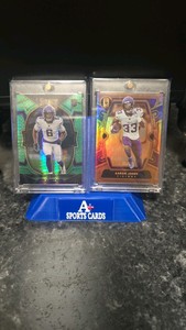 2022 Panini select Lewis Cine Dragon scale 0699.  2024 Panini Gold Standard Aaron Jones 0914