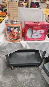 Coca Cola Dishes , and unopened tin with railroad toy on top
