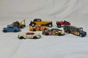 Assorted Vintage Diecast Toy Vehicles  Mix of Trucks, Race Cars, and Classic Cars