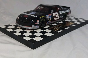 Dale Earnhardt Sr. Goodwrench Monte Carlo  Black Diecast Number Seven Win Replica on Checkered Base