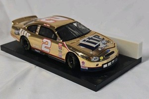 Rusty Wallace Miller Lite Ford Taurus  Gold Chrome Diecast on Black Base