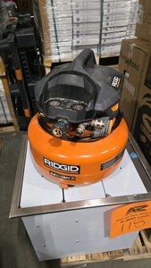RIDGID 6 Gal. 150 PSI Portable Electric Oil-Free Jobsite Pancake Air Compressor with Dual Pressure Gauges and 2-Quick Couplers