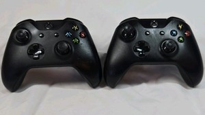 Pair of Black Xbox One Wireless Controllers