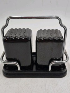 Vintage Black Ceramic Salt and Pepper Shakers with Chrome Caddy
