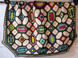 Vintage Crocheted Granny Square Afghan  Multicolor Oval Floral Motifs on Brown Ground