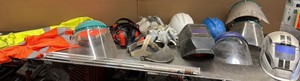 WELDING helmets, construction gear, ear and mouth protection