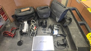 JVC Camcorder, Nikon L105 camera, Eddie Bauer Rechargable  DVD player