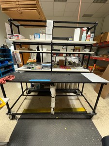 Mobile work station with shelves attached