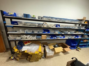 rolling shelf with hardware (items on floor not included)
