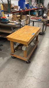 Rolling table with outlet