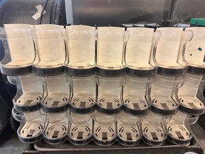 adjustable spring feed bottle organizers