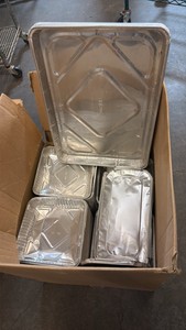 assorted boxes of Aluminum trays