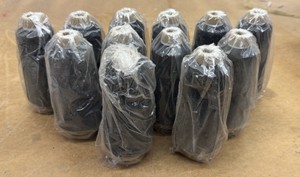 black spools of thread all new
