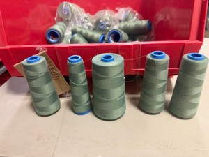 Bucket of serger threads