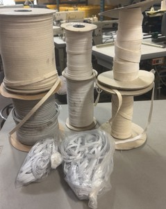 spools of elastic various colors and sizes