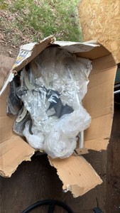box of hangers and horse decorations