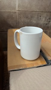 two boxes containing mighty mug 15 ounce coffee cups