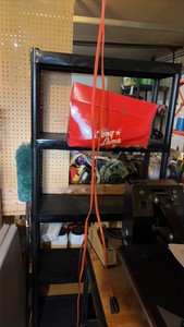 plastic adjustable shelf. contents not included