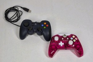 Lot of 2 Game Controllers Xbox Style Pink Wired Logitech Black USB