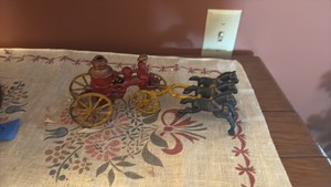 Vintage cast iron 3-horse drawn fire wagon
