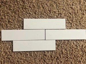 3x12 White Ceramic Tiles. Partial Box. Bright White. Approximately 20 tiles in box.