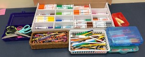 A lot of markers, scissors, crayons, and colored pencils (R214)