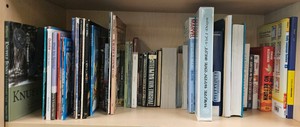 full Shelf of miscellaneous books  (r212)