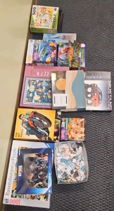 assortment of puzzles  (r211)
