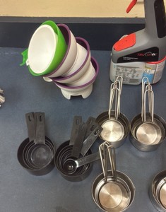 miscellaneous measuring cups and cleaner (R132)