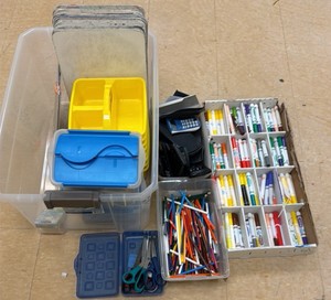 lot of calculators markers, colored pencils, scissors, small whiteboards (R124)