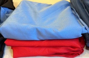 Red round tablecloth and blue table cloth (gym)