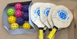 pickleball paddles and balls (gym)