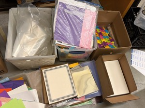 construction paper, various new packs of paper, tissue paper, and clear bags (r137.5)
