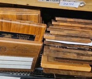 shelf of plaques new and used (r137.5)