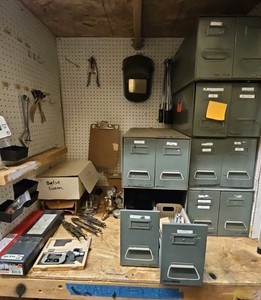 shelf of welding supplies and measuring instruments (r137.5)